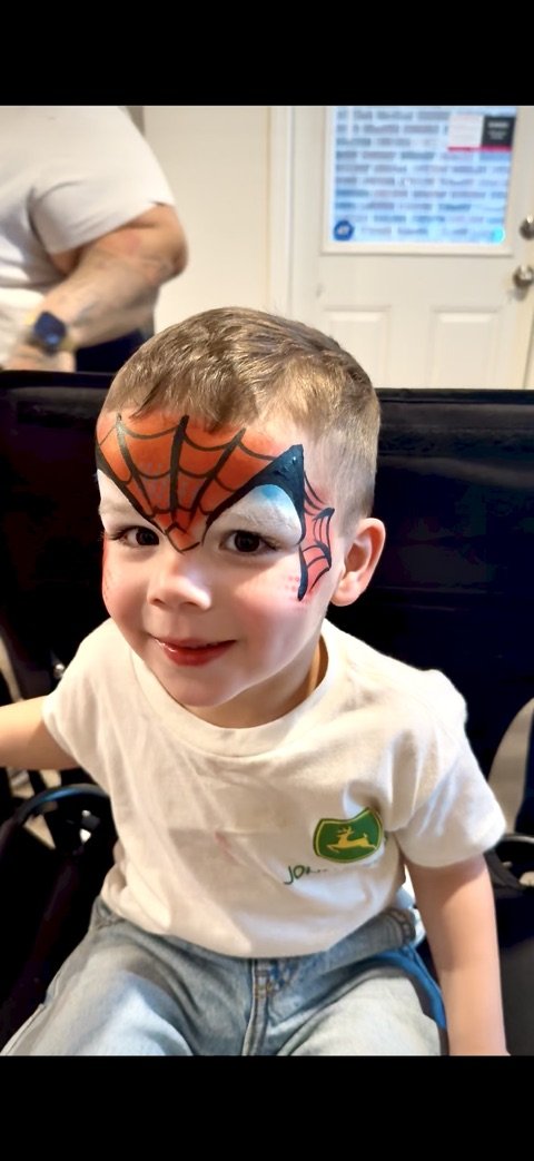 Spider-Man face painting by CandyProArt