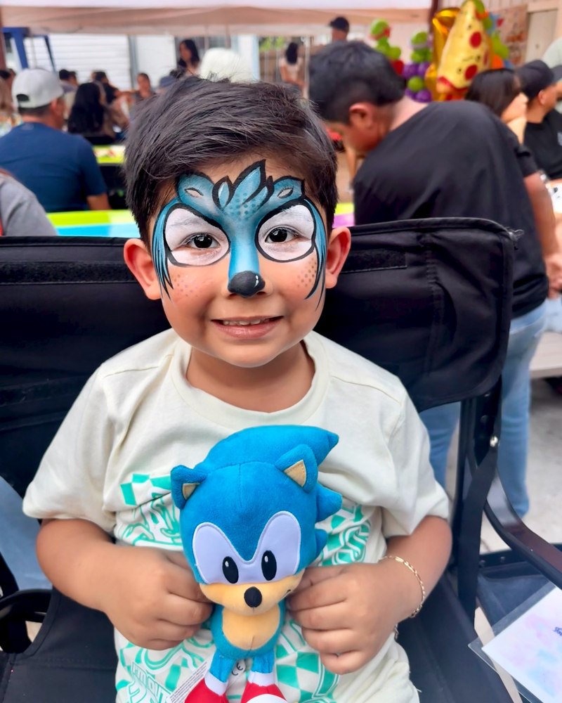 Sonic-inspired face painting by CandyProArt