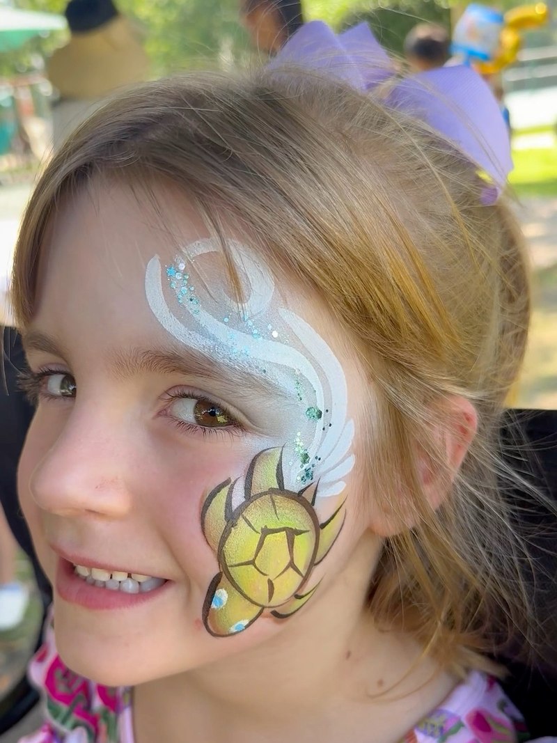 Turtle cheek artwork with flowing white details by CandyProArt