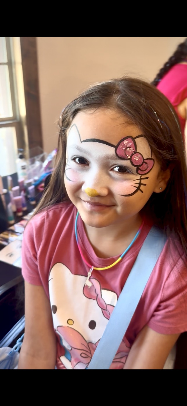 White and pink cat face painting